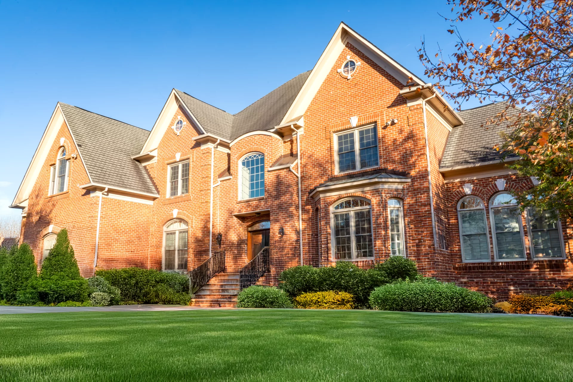 Brick home with Fortis Beige windows