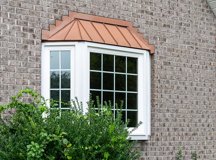 Vytex bay window with copper roof