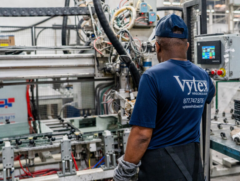 Vytex employee on glass line
